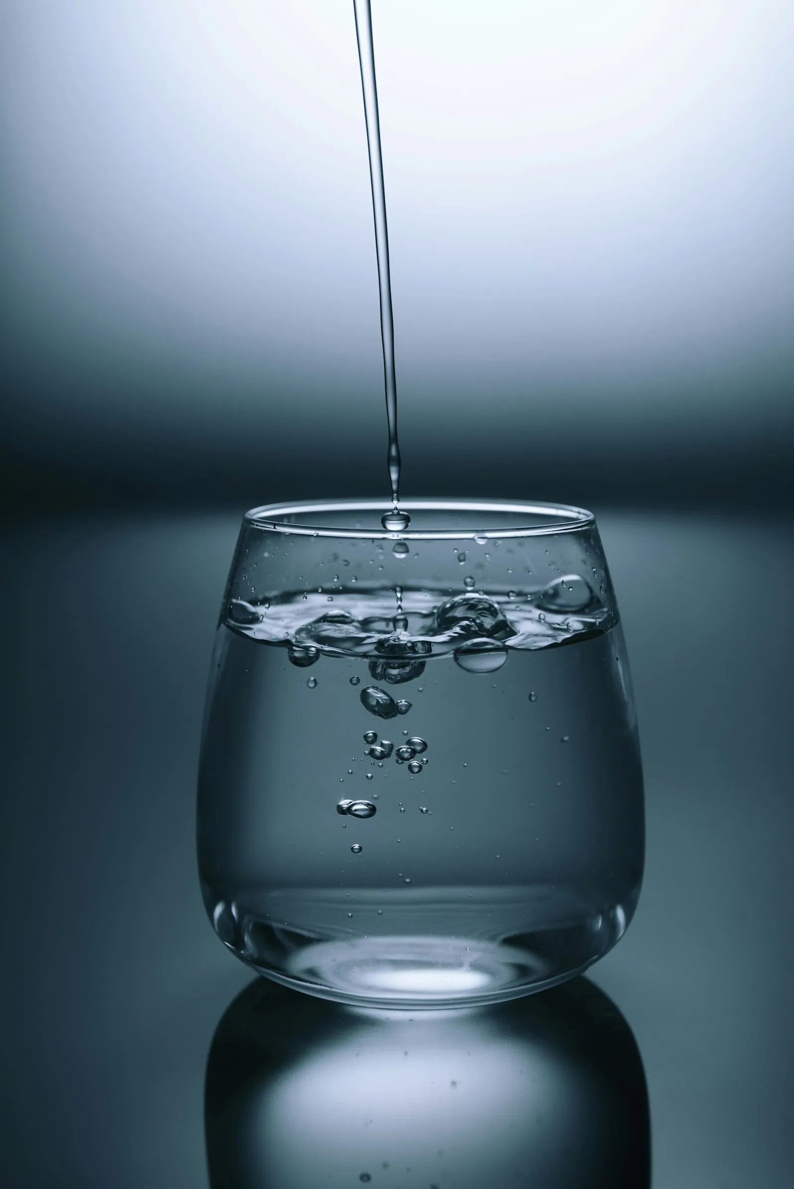 Water pouring into a glass